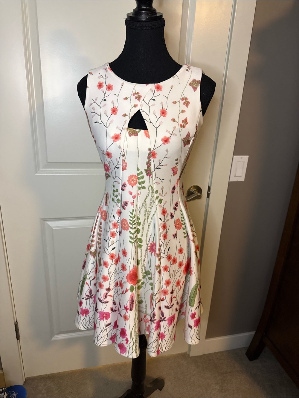 Sleeveless White Floral Fit-and-Flare Mini Dress with Pink Accents